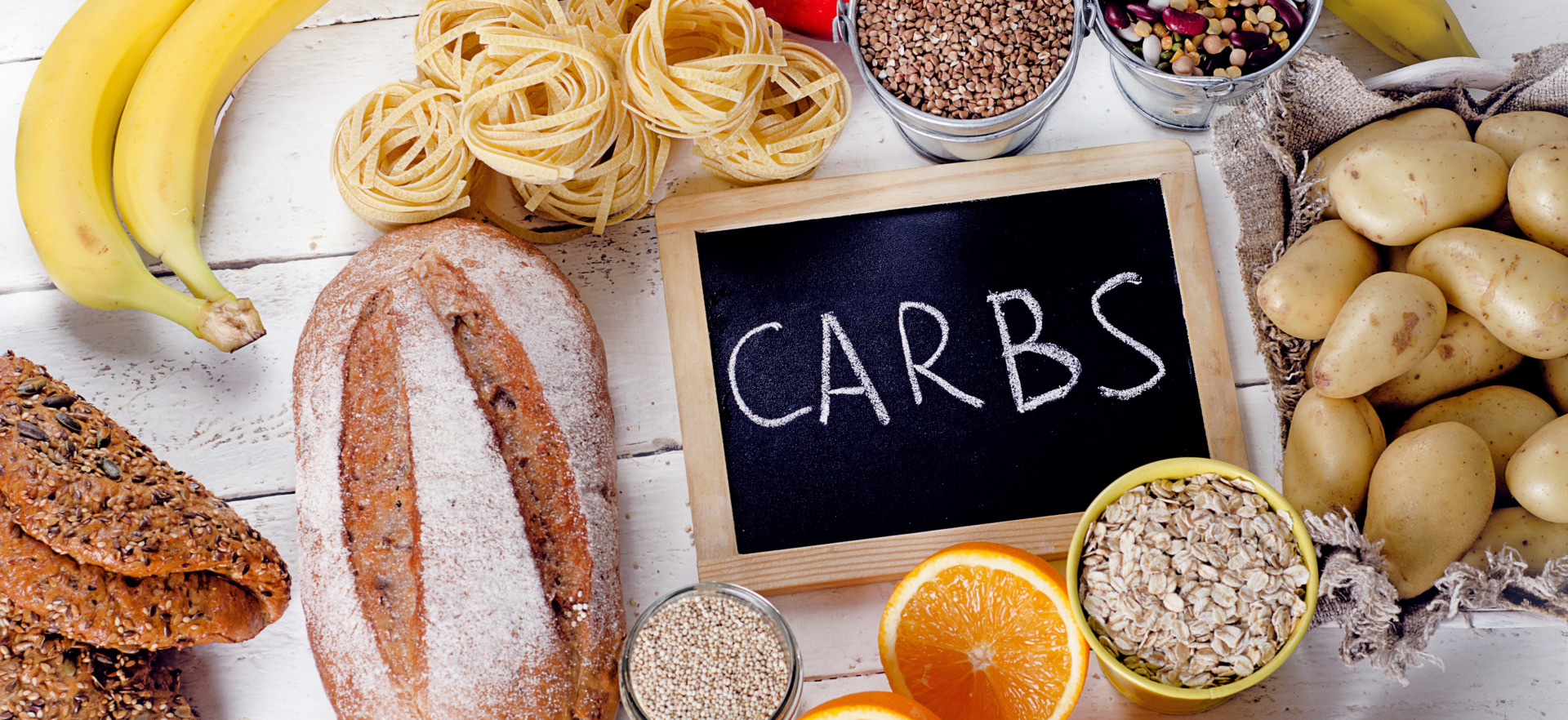 A selection of foods that are high in carbohydrates. Raging Bull Snacks are low in carbs.