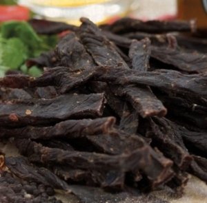 Biltong Snap Sticks, also known as Stokkies (meaning "little sticks" in Afrikaans), are thinly sliced strips of premium beef biltong, air-dried to a perfect crispy snap. These addictive, high-protein snacks pack authentic South African flavour into every bite—featuring traditional spices like black pepper and coriander, marinated and slowly dried. With over 50% protein content and low carbs, this 250g bag is the ideal guilt-free snack for busy lifestyles, whether you're at work, hitting the gym, or simply craving a savoury treat. MSG-free, gluten free and made in the UK. Free UK delivery available.